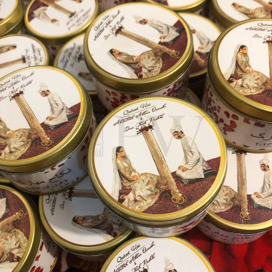 Traditional Nikah Ceremony Illustration on a Gold Rimmed Metal Tin